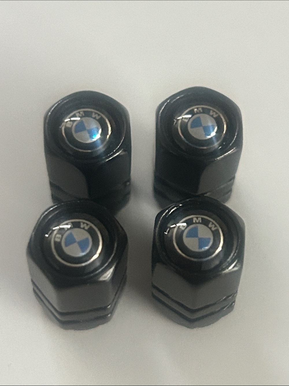 BMW Black Tire Valve Caps with Roundel Accent (Set of 4)